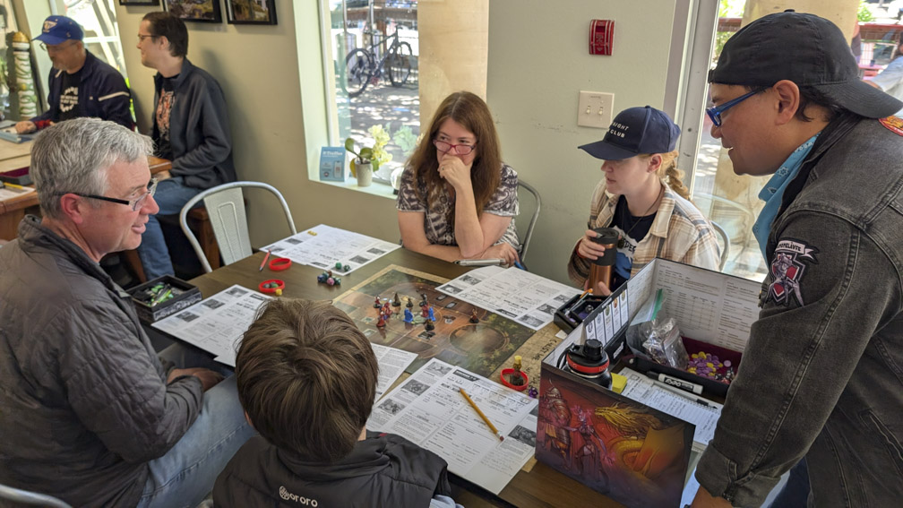 People playing Daggerheart, a table-top role-playing game.